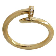 RR-5262 - Anillo de oro de 18k con forma de clavo y circonitas