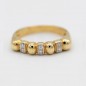 107338 - Anillo de oro 18 kilates con 6 circonitas